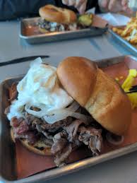 Cleats signature dishes Pit Beef Sandwich, Fried Chicken Sandwich, Fish Sandwich, Summer Salad, Chicken Wings